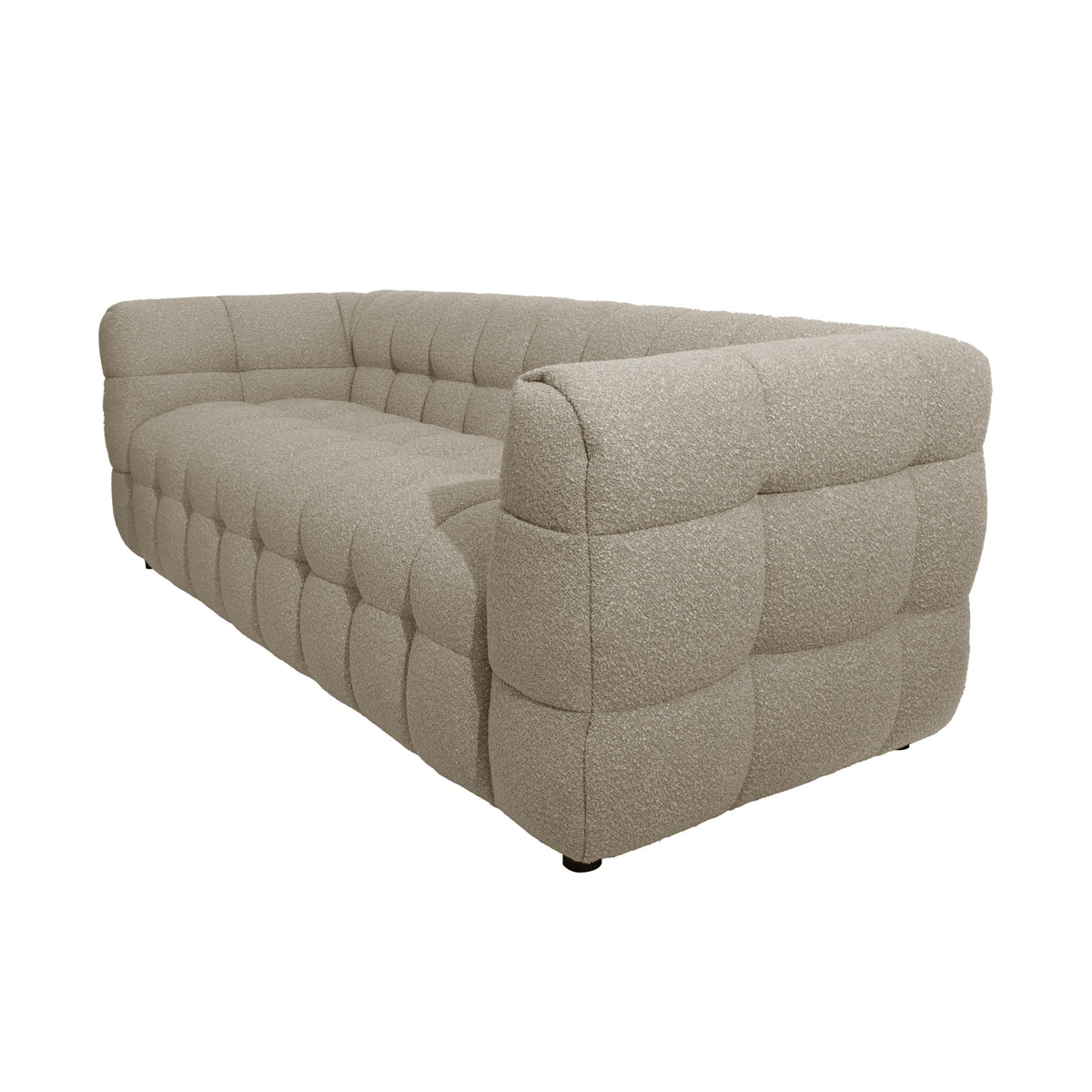 Norah 3 Seater Boucle Sofa in Warm Beige, showcasing a contemporary, low-profile design with deep squared tufting on a textured bouclé fabric, exuding modern elegance and comfortable support.