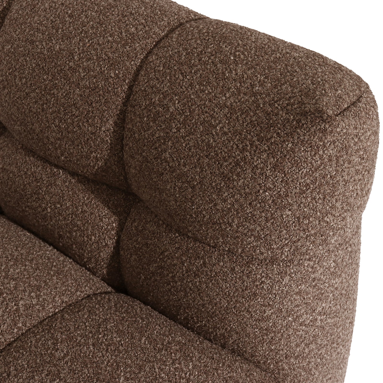 Close-up of the textured boucle fabric and stitching on the Norah Boucle Single Seater Sofa in Brown, showcasing its plush upholstery and craftsmanship that enhance modern charm and comfort.