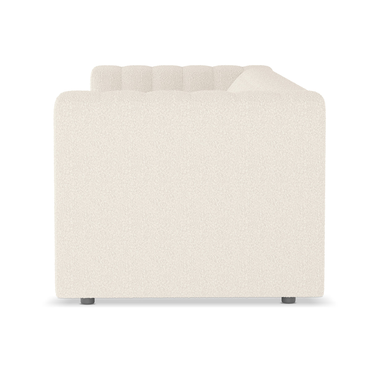 Parisa 3 Seater Tufted Boucle Sofa in Cream White, featuring a modular design with squared-off arms, tufted back cushion, and short, cylindrical feet, upholstered in light-cream boucle fabric.
