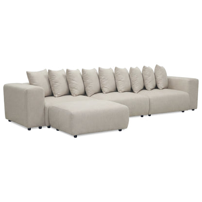 Large modern sectional sofa set with matching ottoman on white background