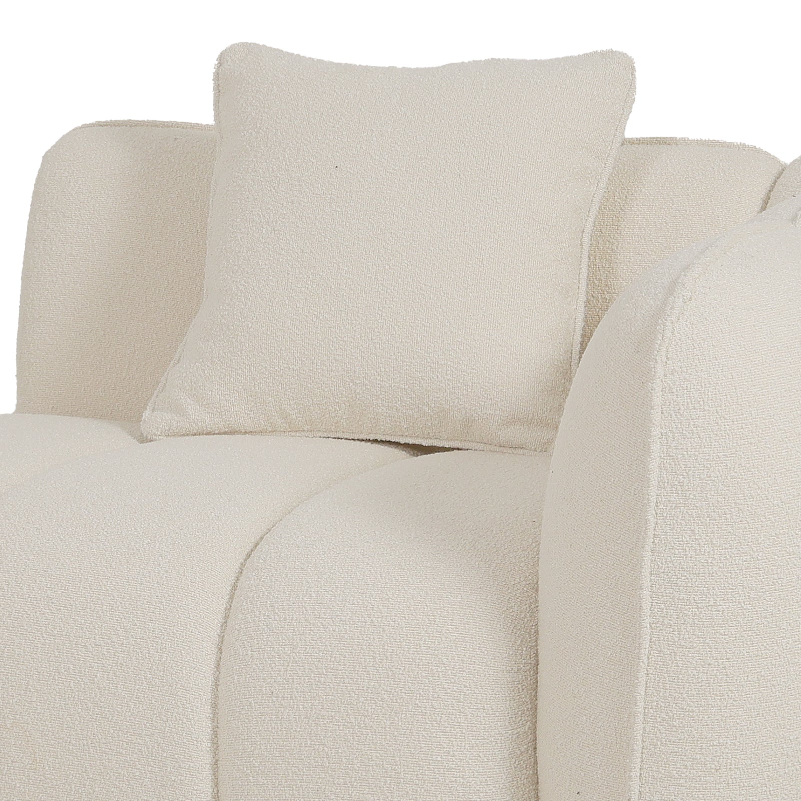 Close-up of cream boucle sofa with rounded cushions and matching throw pillow, showing textured fabric detail