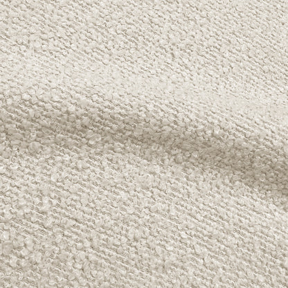 Close-up of cream white performance boucle fabric texture showing woven looped yarn detail
