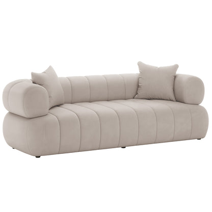 Samira 3 Seater Velvet Sofa - Warm Beige, showcasing plush velvet upholstery with a sleek design, high-density foam padding, and two matching pillows, perfect for modern living spaces.