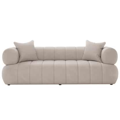 Samira 5 Seater Velvet Sofa Set in Warm Beige, showcasing plush velvet upholstery and elegant design with included white pillows, emphasizing luxurious comfort and sophisticated style.