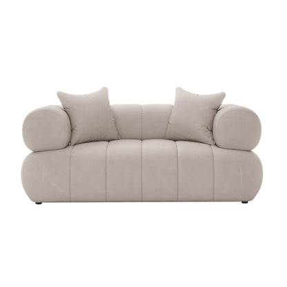 Samira 5 Seater Velvet Sofa Set - Warm Beige, showcasing a plush velvet texture with a close-up of the couch and accompanying pillows, highlighting luxurious craftsmanship and elegant design.