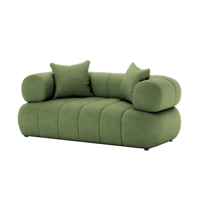 Samira 6 Seater Velvet Sofa Set Prasinous Green, featuring plush velvet upholstery, visible on a green couch with coordinating pillows, highlighting comfort and luxury in a spacious, elegant design.