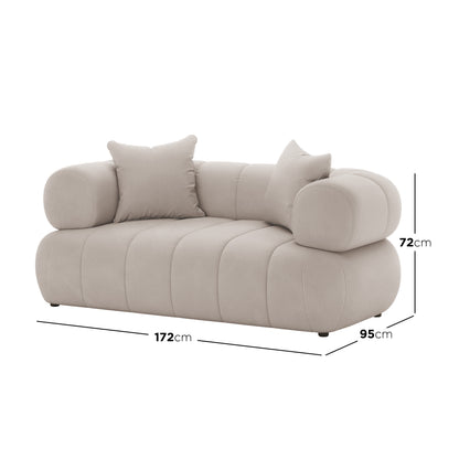 Samira 6 Seater Velvet Sofa Set - Warm Beige, showcasing plush velvet upholstery and elegant design, highlighting a cushion and part of the sofa's armrest for luxurious comfort.