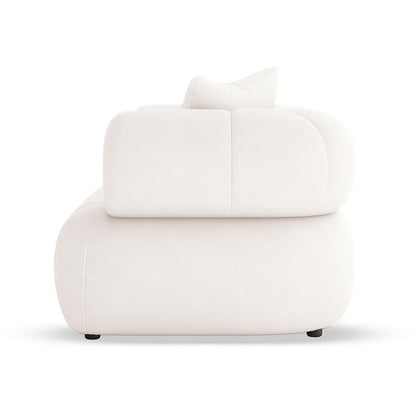 Samira 2 Seater Velvet Lounge in Cream viewed from the side, featuring a low-profile design with rounded cushions and a matching back pillow, set against a plain white background.