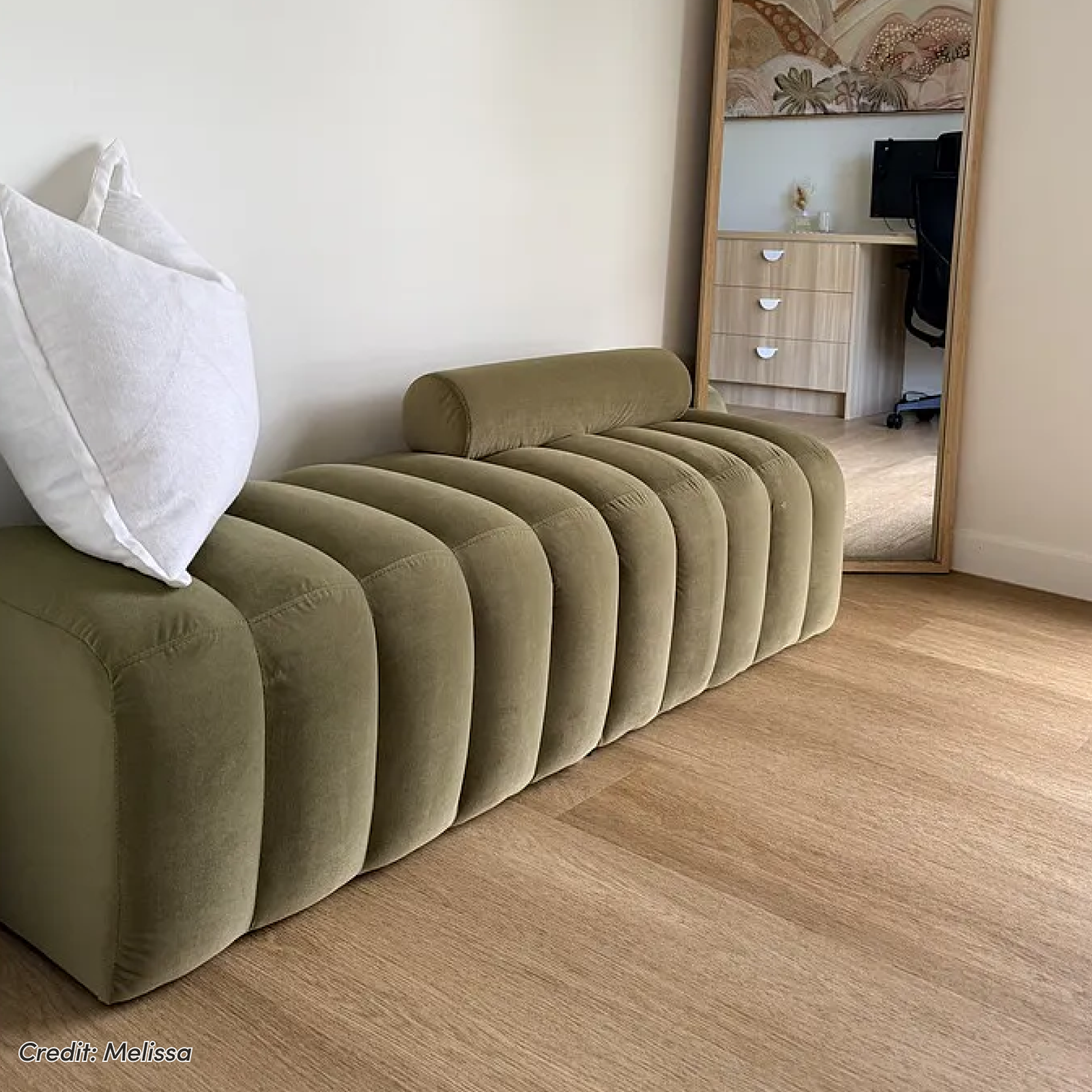 Sasa Velvet Bench with Backrest in Sage, featuring rounded tubular cushions and a cylindrical bolster pillow, shown on timber