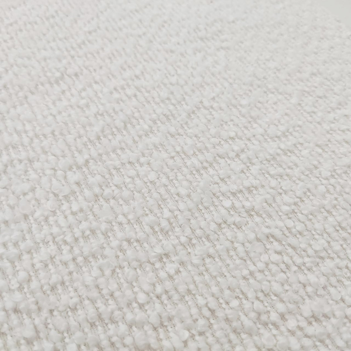 Seto Bouclé Curved Occasional Accent Chair in eggshell white, featuring a soft, loop-pile bouclé fabric with a nubbly texture, highlighting its curved backrest and plush design for stylish comfort.