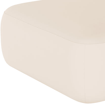 Close-up of Soraya Velvet Ottoman in Cream White, showcasing the corner with rounded edges and a seam where the lid meets the base, highlighting its sleek, modern design.