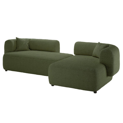 Susie 4-Seater Boucle L-Shaped Sofa in Dark Green featuring ergonomic curved backrest and plush boucle upholstery, highlighting its sectional design ideal for corner placement and maximizing seating space.