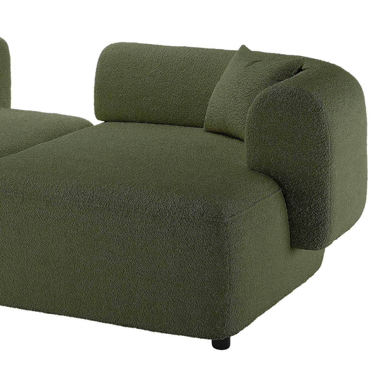 Susie 4-Seater Boucle L-Shaped Sofa in dark green, highlighting its plush upholstery and ergonomic curved backrest, offering a stylish and spacious seating solution for modern living rooms.