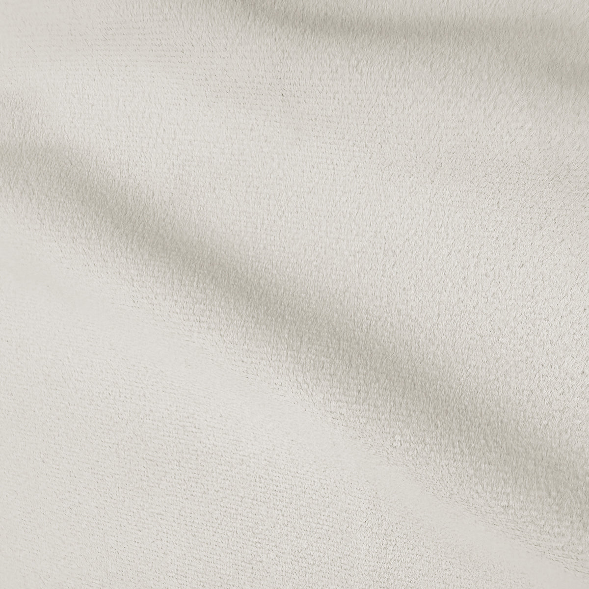 Cream white curved velvet sofa texture detail showing soft plush fabric