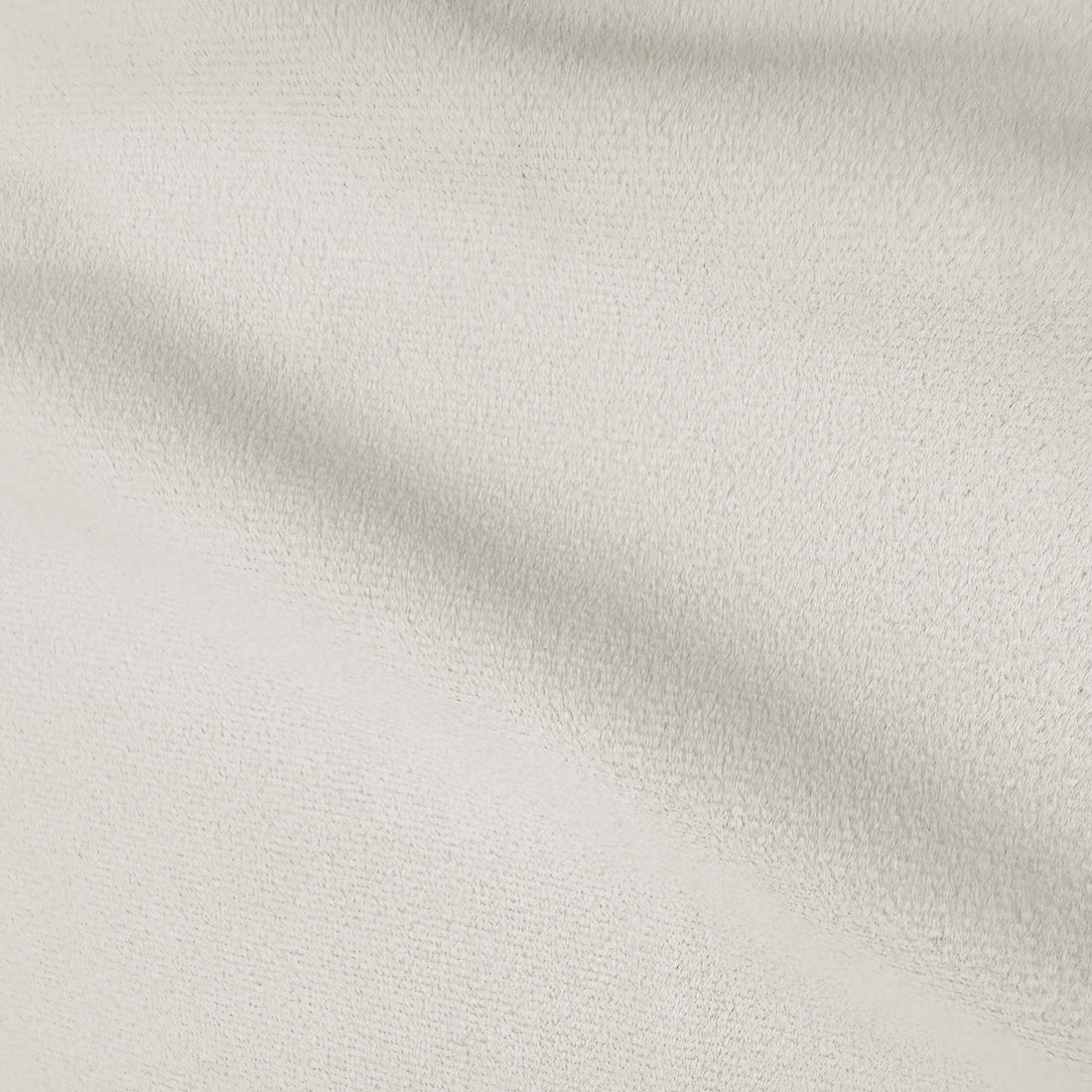 Close-up of cream white velvet upholstery texture showing soft plush pile and subtle sheen