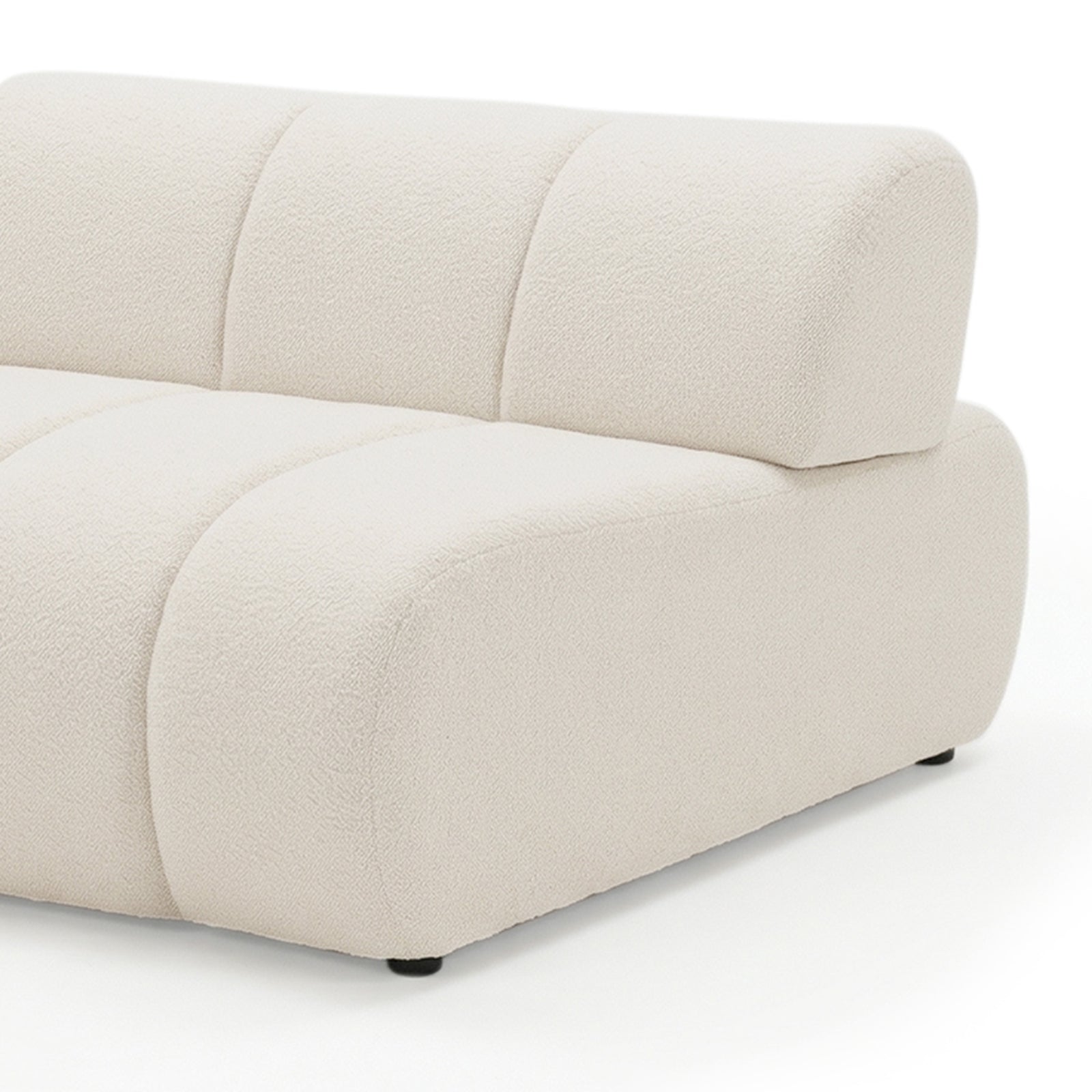 Cream white boucle curved modular sofa with rounded armrest and black feet on white background