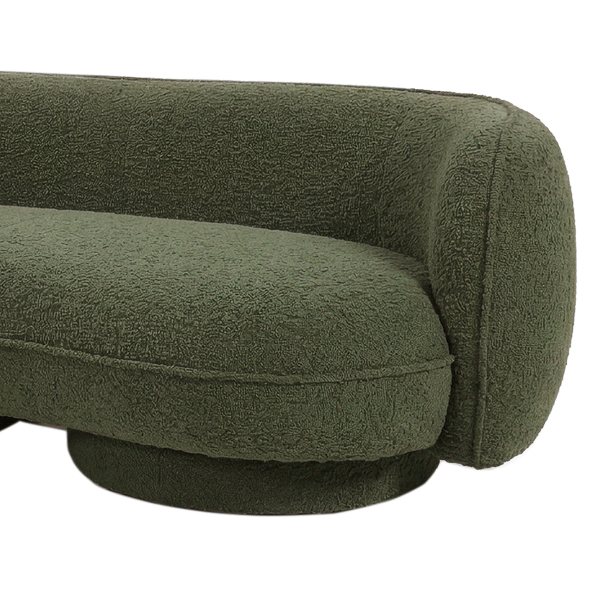 Green boucle curved sofa with rounded arms and textured upholstery