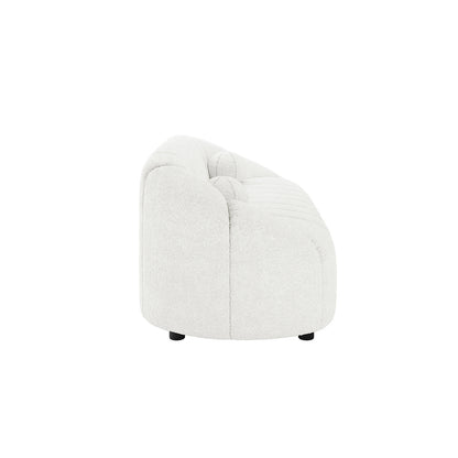 Trina 3 Seater Boucle Sofa with Pillows in Cream White features a low-profile, curved design with tufted back and seat, rounded edges, and short black cylindrical feet, showcasing modern, plush elegance.