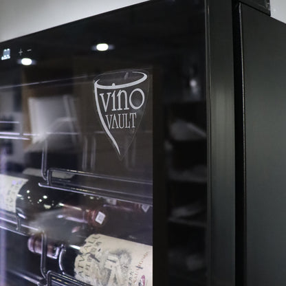 VinoVault 155 Bottle Built-In Single Zone Wine Fridge – Black, featuring a sleek, black tempered glass door with chrome accents, visible touchscreen control, and telescopic shelves, designed for seamless integration into kitchens or cellars.