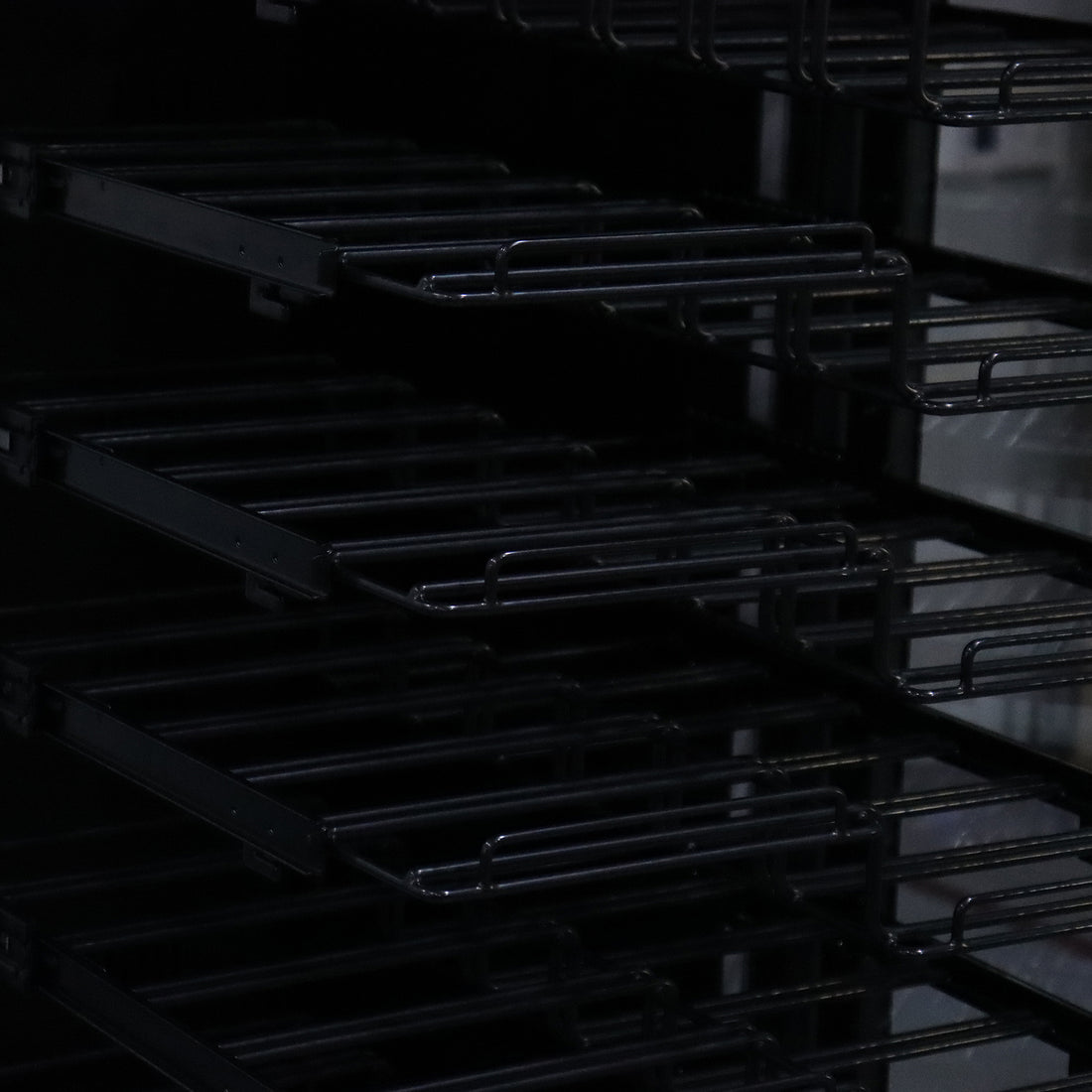 VinoVault 155 Bottle Built-In Single Zone Wine Fridge – Black; features sleek black tempered glass with chrome finishes, customizable LED lighting, and visible telescopic shelves for optimal wine display and storage.