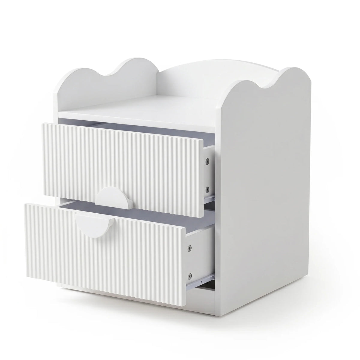 A white bedside table with a scalloped-edge top and two drawers featuring fluted fronts and semi-circular handles.