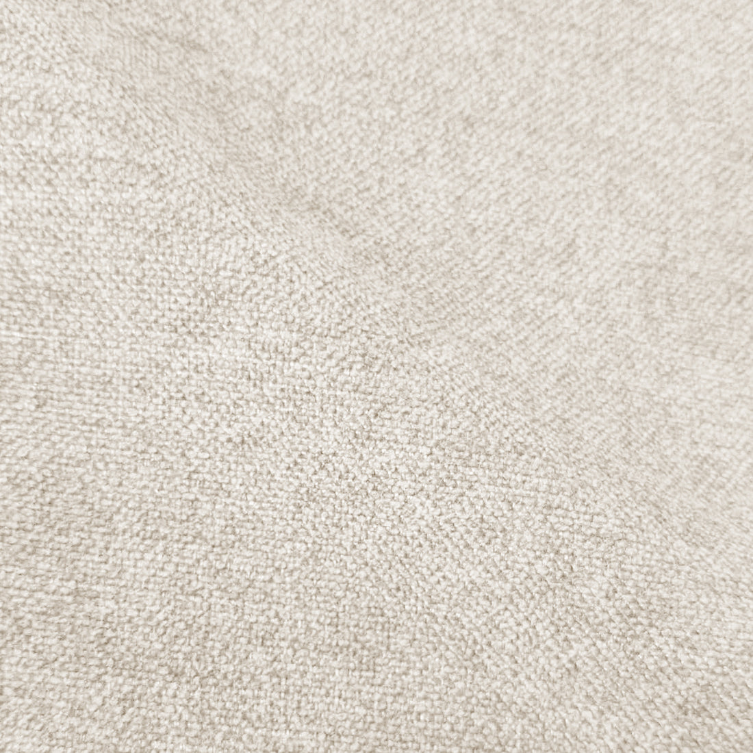 Extreme close-up of beige upholstered fabric texture