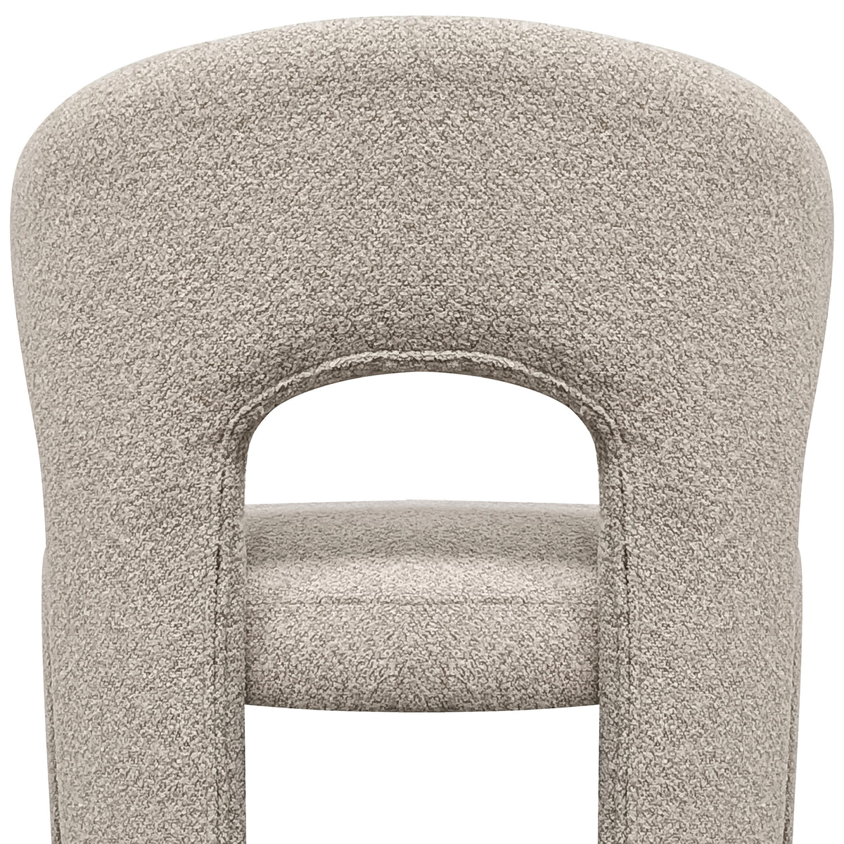 Lunari Bouclé Curved Accent Chair in Beige features a plush, sculpted backrest with a keyhole cutout, padded legs, and a minimalist design, offering comfort and style for modern spaces.