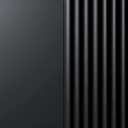 Close-up of a black product surface with smooth and ribbed textures.