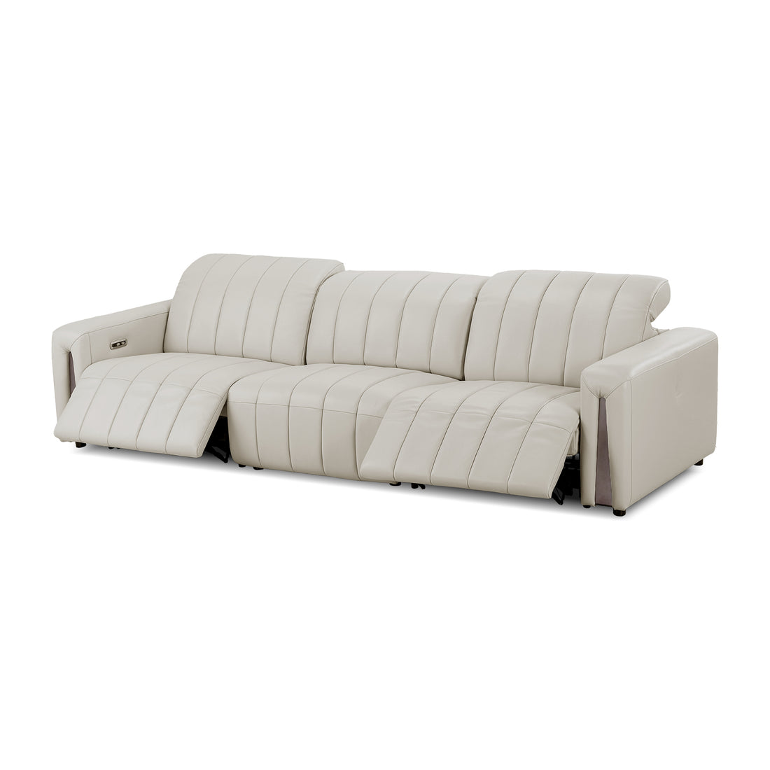 Light beige sectional sofa with extended footrest on a white background.