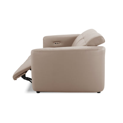 Side view of a beige recliner with footrest extended on a white background
