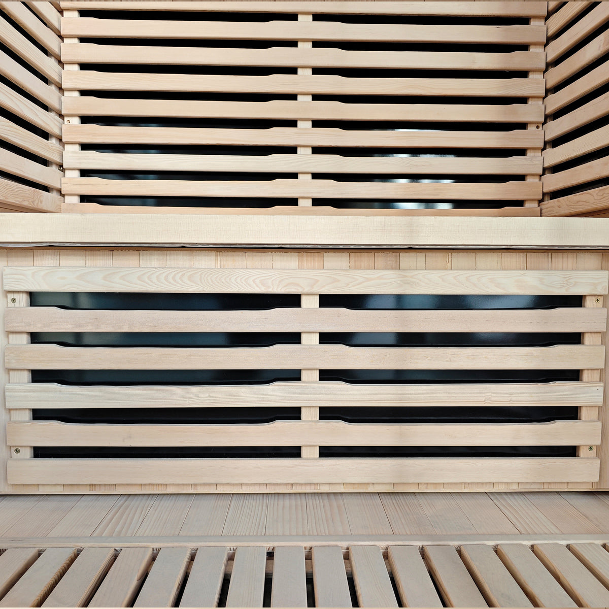 Close-up of wooden sauna bench and slatted interior seating.