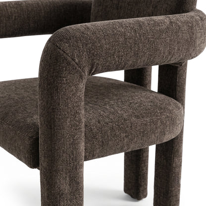 Close-up of the seat and arm of a dark brown upholstered chair on a white background