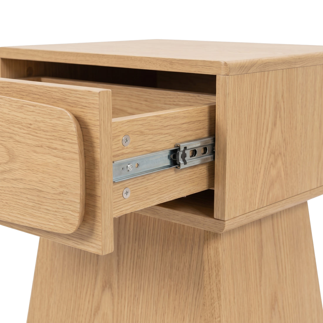 Close-up of a wooden nightstand drawer on a white background