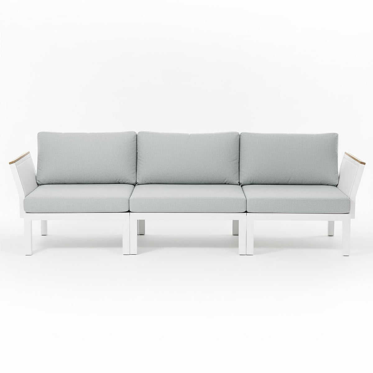 Sierra Outdoor Lounge Set in Grey: Modern three-seat sofa with white metal frame, light gray cushions, angled arms with wood accents, ideal for creating a resort-like ambiance in outdoor spaces.
