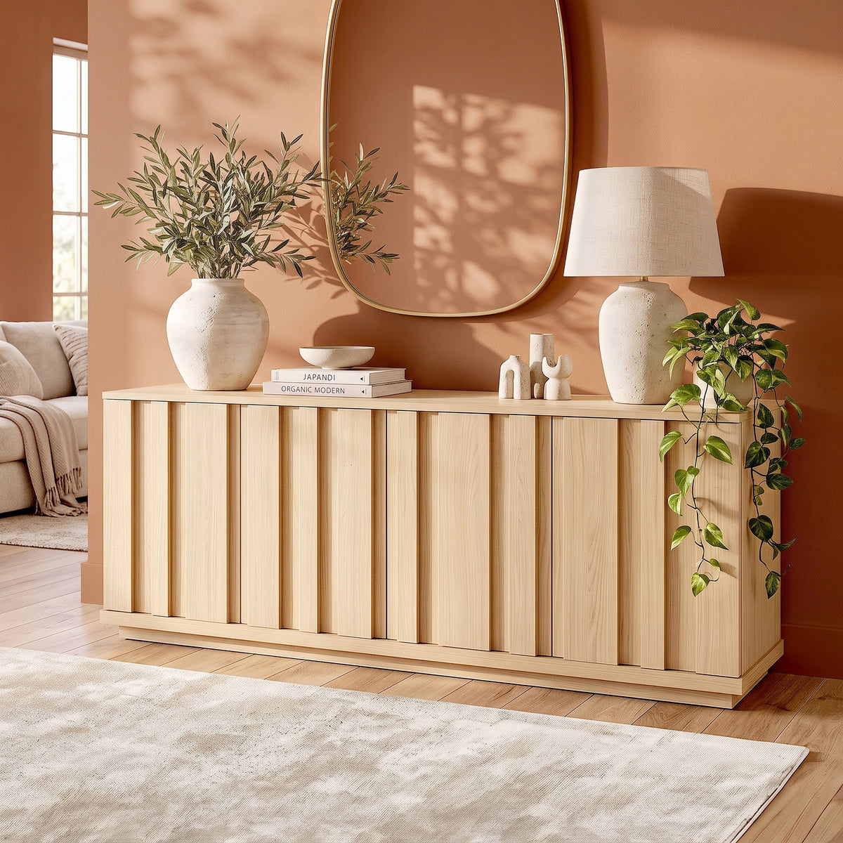 Light wood sideboard in a styled room with decor