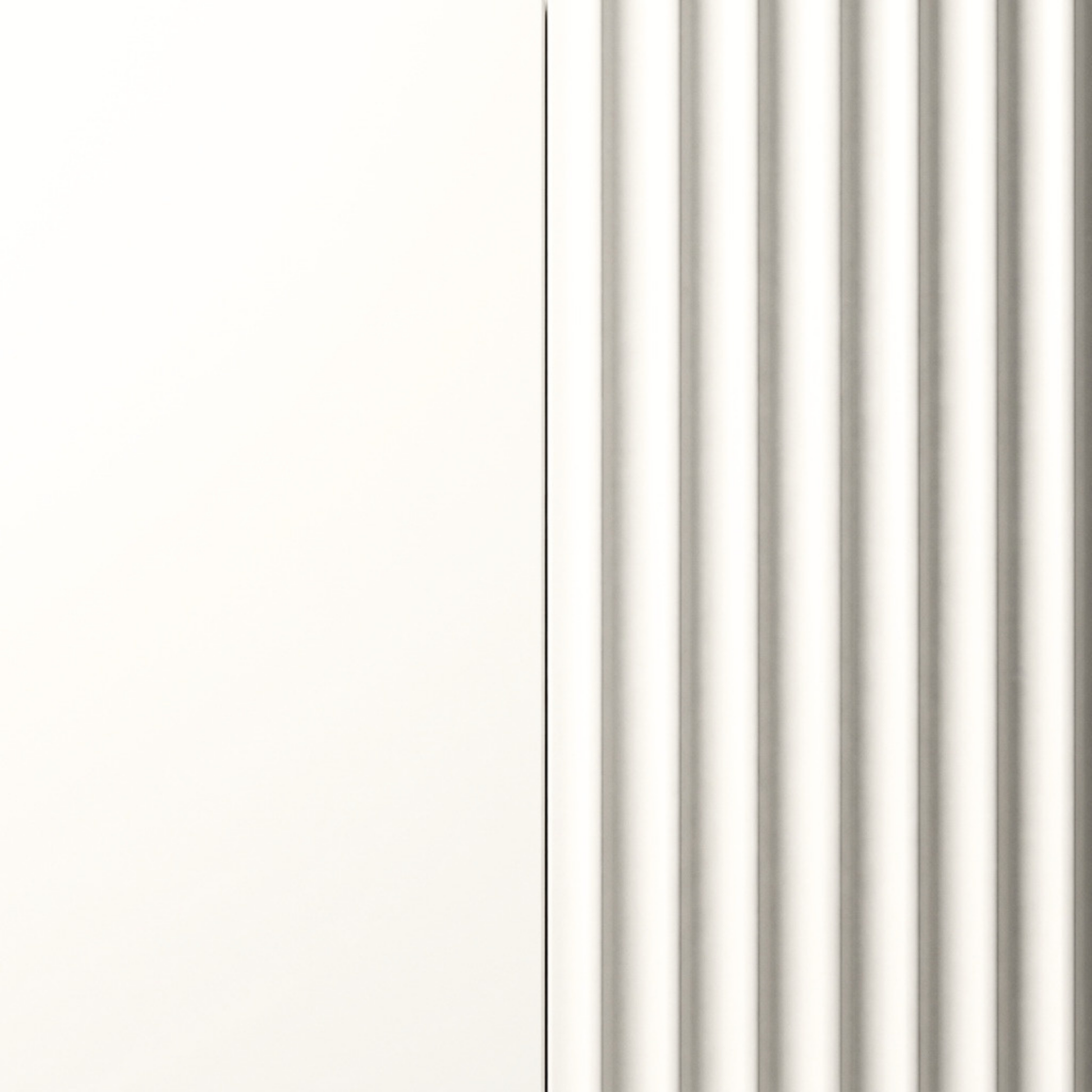 Close-up detail of a white textured furniture surface.