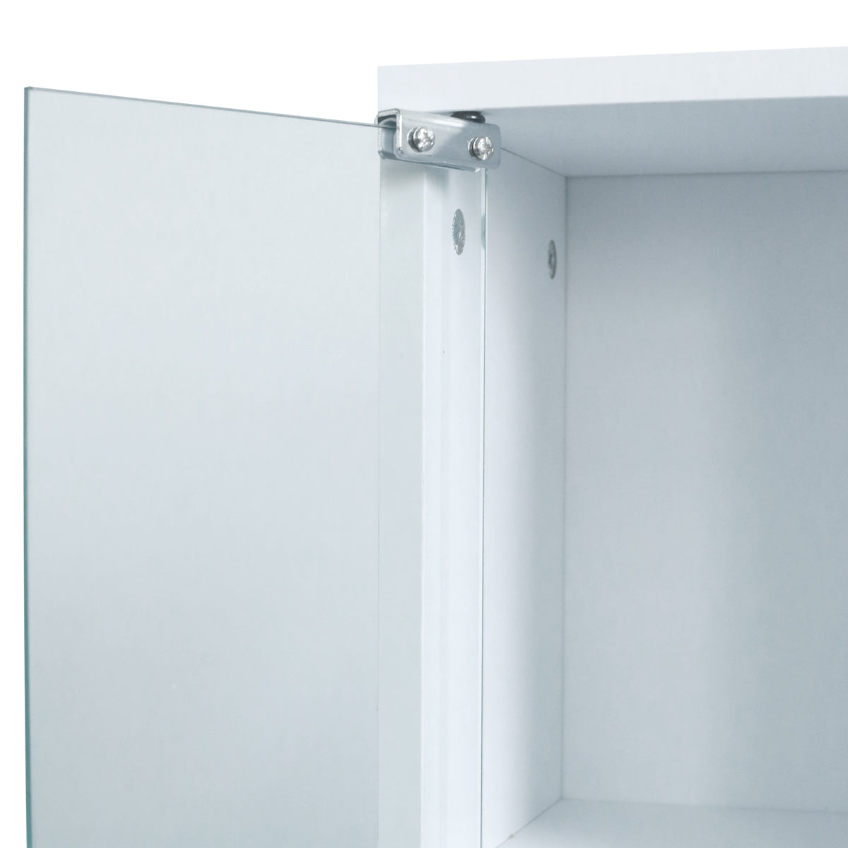 Close-up of mirrored cabinet hinge and interior corner