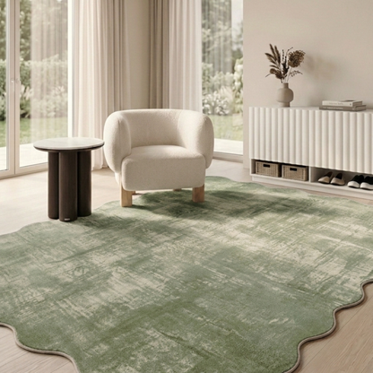 Green scalloped-edge rug shown in a styled living room