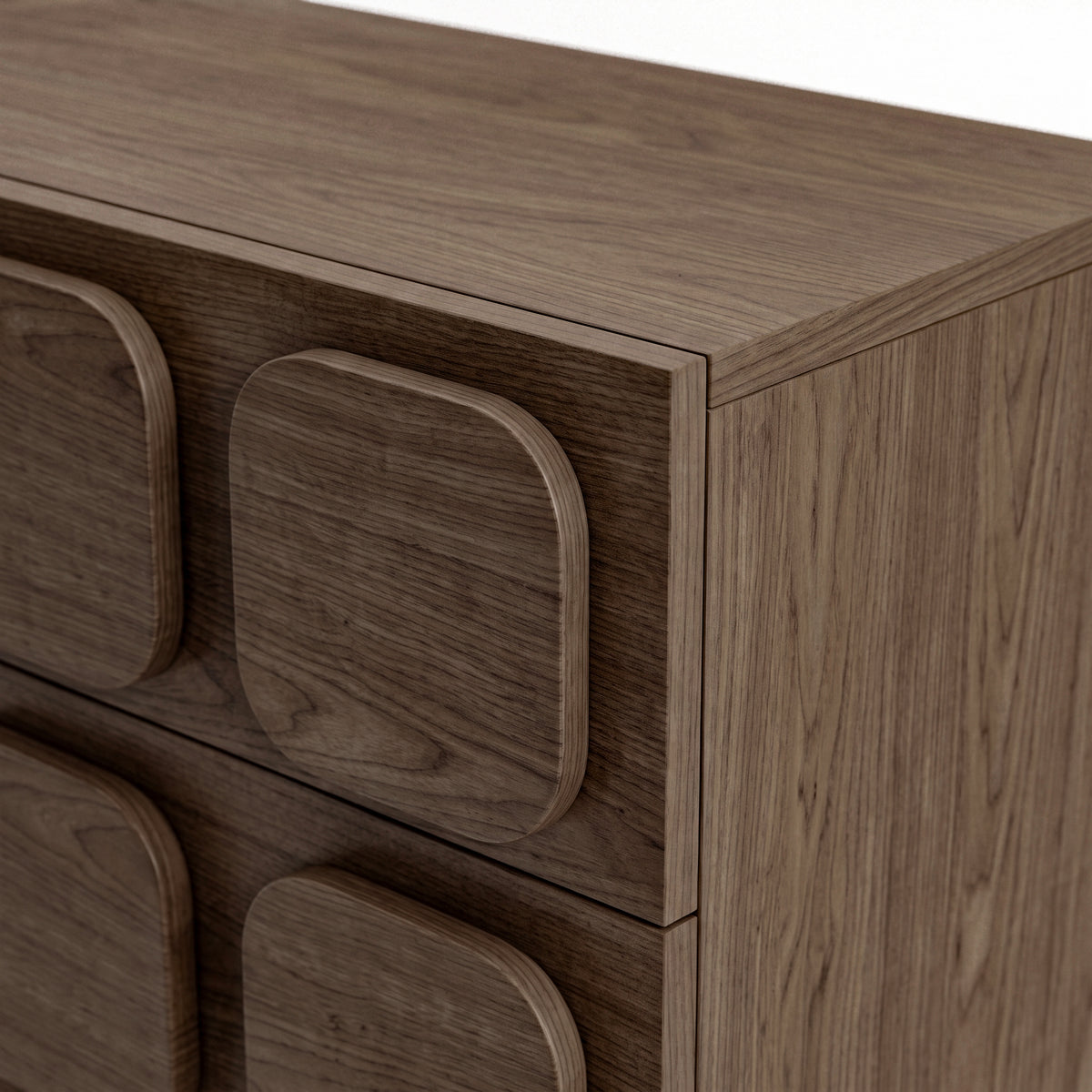 Close-up of the upper section of a wooden cabinet with rounded square drawer-front details on a white background