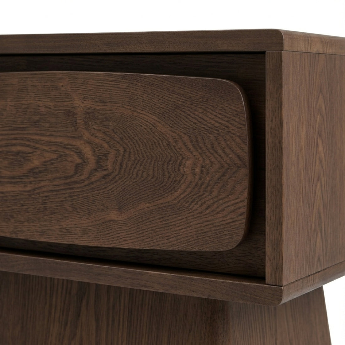 Close-up of the corner and drawer of a wooden nightstand