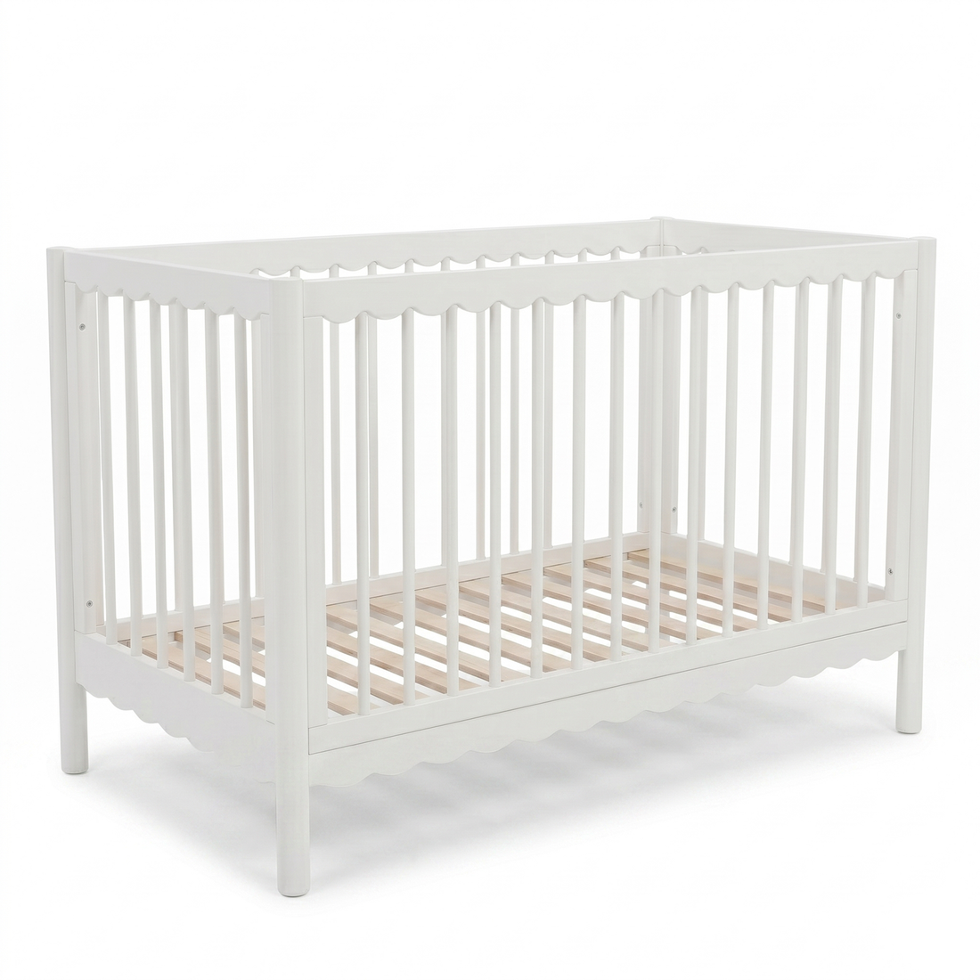 Full view of white wooden baby crib on a white background
