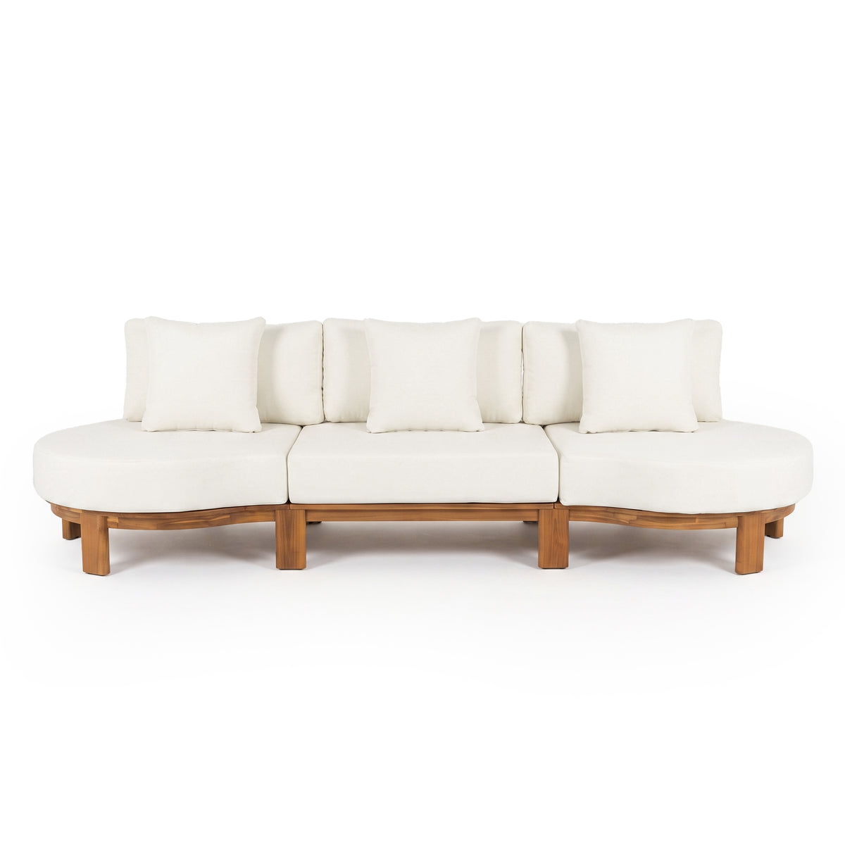 Modern white sofa with wooden base and five back cushions on a white background.