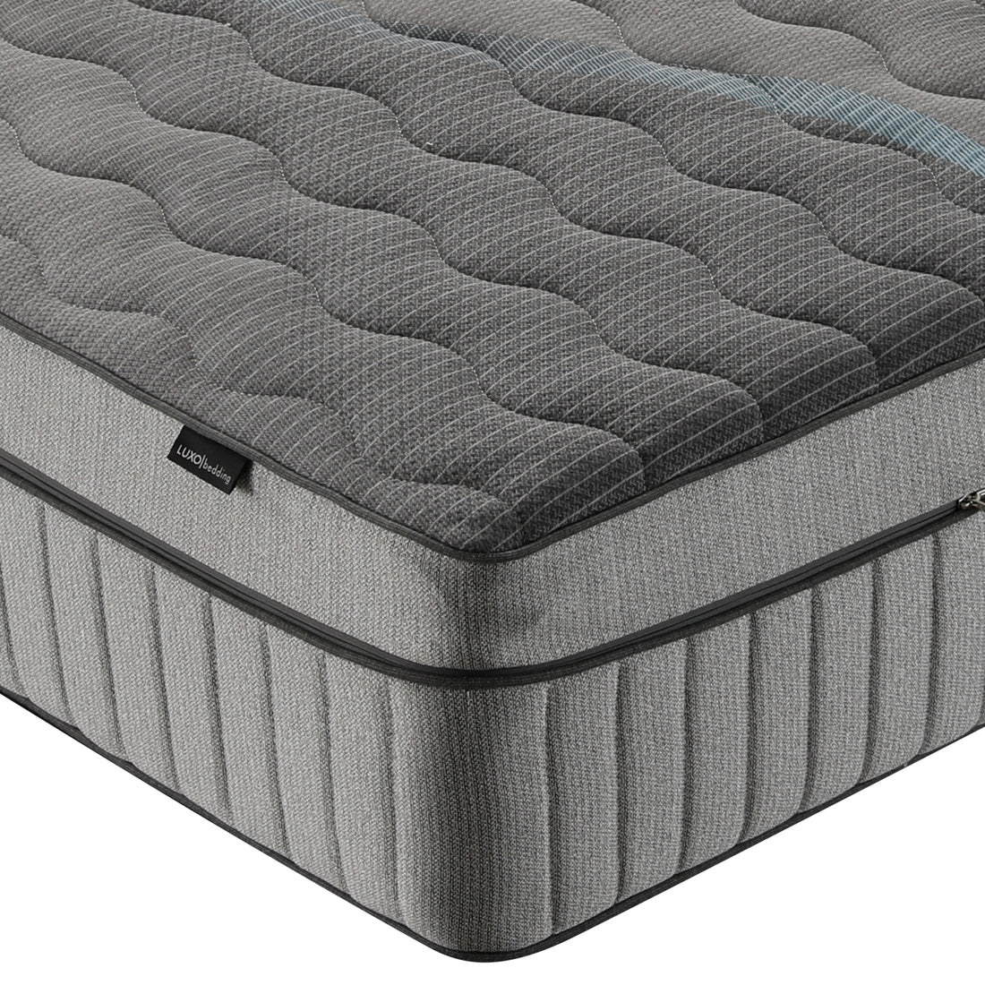Close view of mattress corner and side on white background