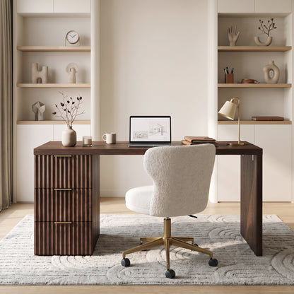 Dark wood desk in a styled home office with chair and decor
