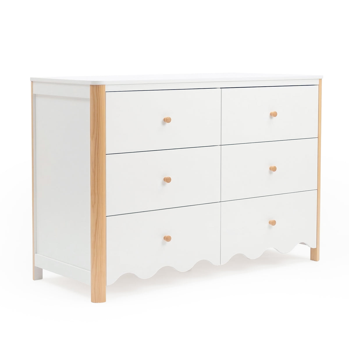 White six-drawer dresser with light wood corners and scalloped bottom on a white background