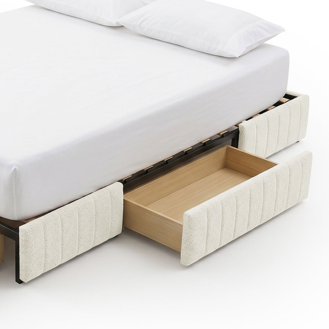 Upholstered bed with partially pulled wooden storage drawer on white background