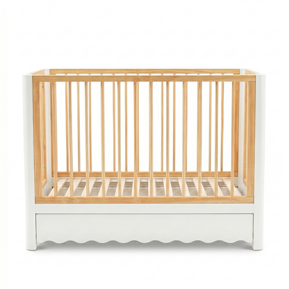 Front view modern baby crib with natural wood slats and white panels on white background