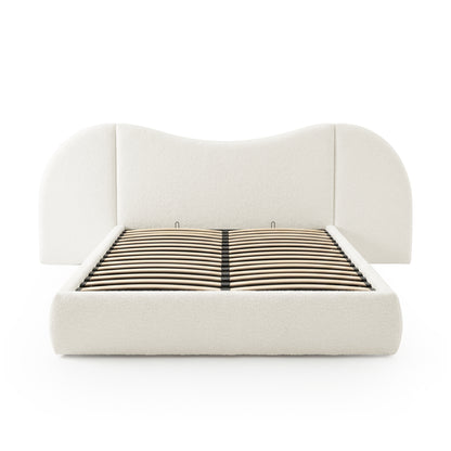 Front view of upholstered bed frame with padded headboard on white background