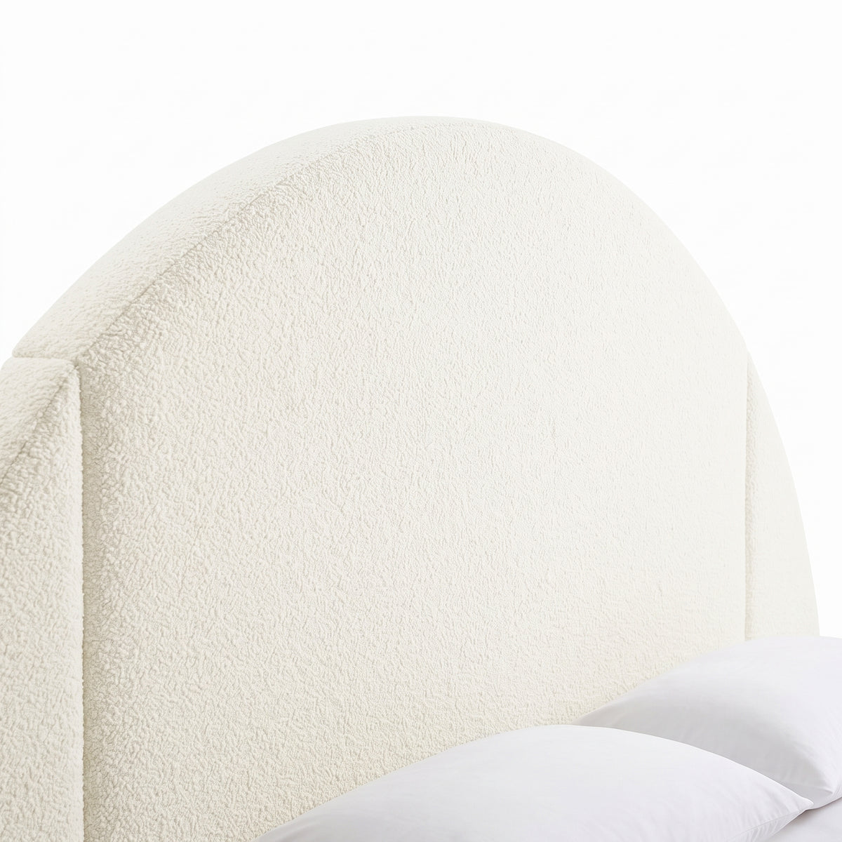 Close-up of an upholstered headboard on a white background