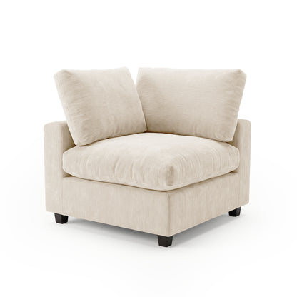 Light beige upholstered corner chair on white background